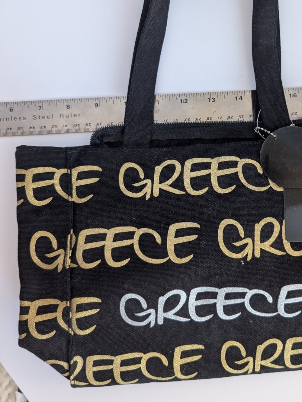 Robin Ruth Greece Bag. NWT. Black with Gold and Silver Letters.